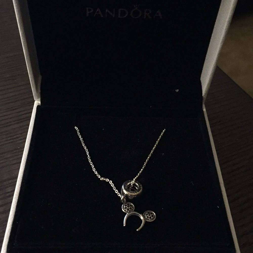 Pandora Disney necklace on silver chain.